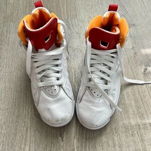 Nike Jordan’s White and Red High-Top Sneakers